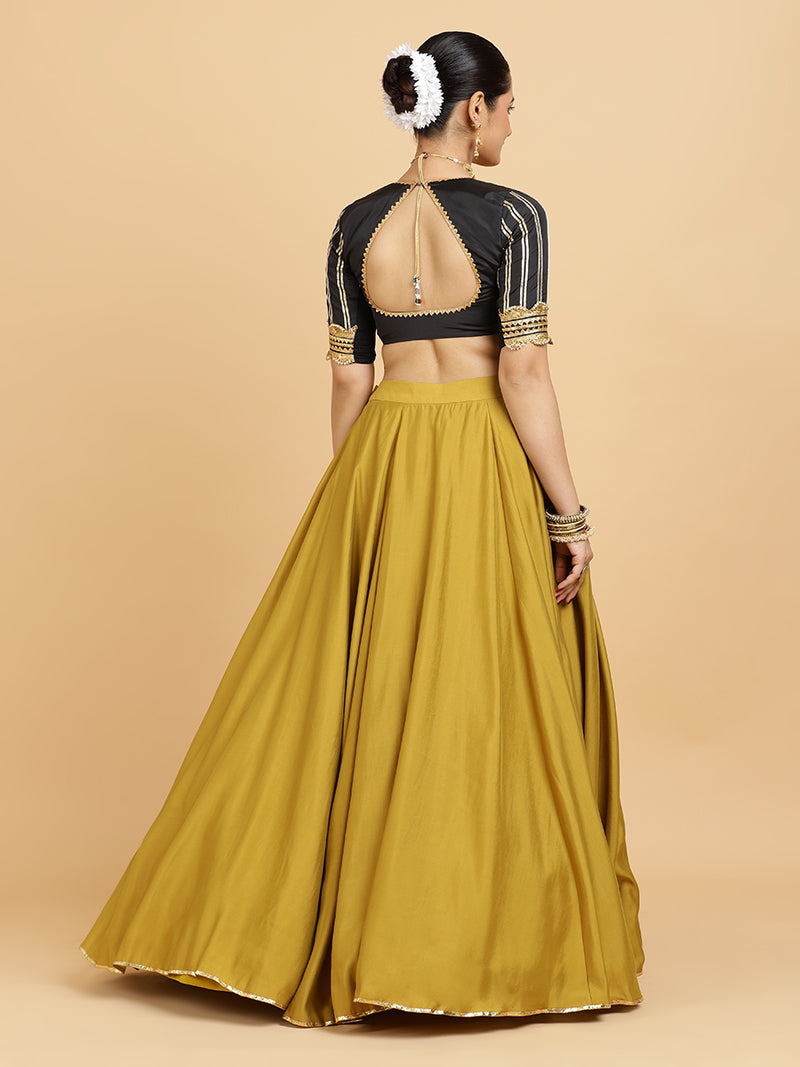 Jhalak Aziza 4-Pc Lehenga Set x Tyohaar | Mustard Lehenga, Charcoal Black Blouse with Chandni Black Dupatta and Cancan Skirt-Binks