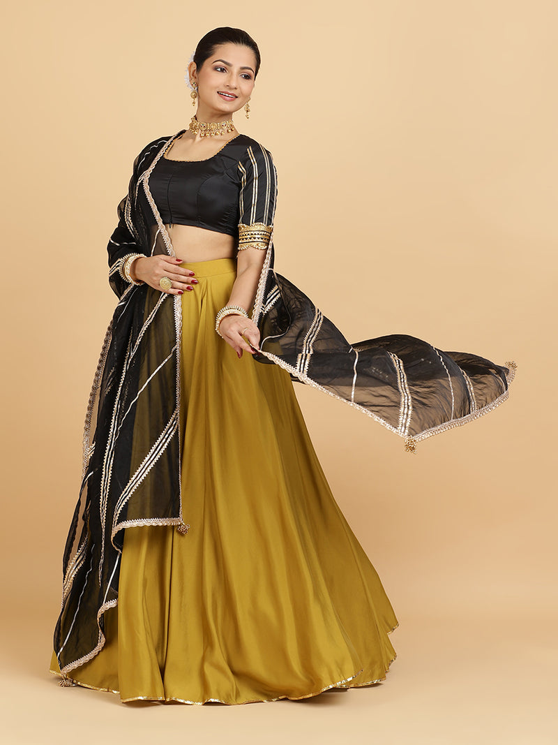Jhalak Aziza 4-Pc Lehenga Set x Tyohaar | Mustard Lehenga, Charcoal Black Blouse with Chandni Black Dupatta and Cancan Skirt-Binks