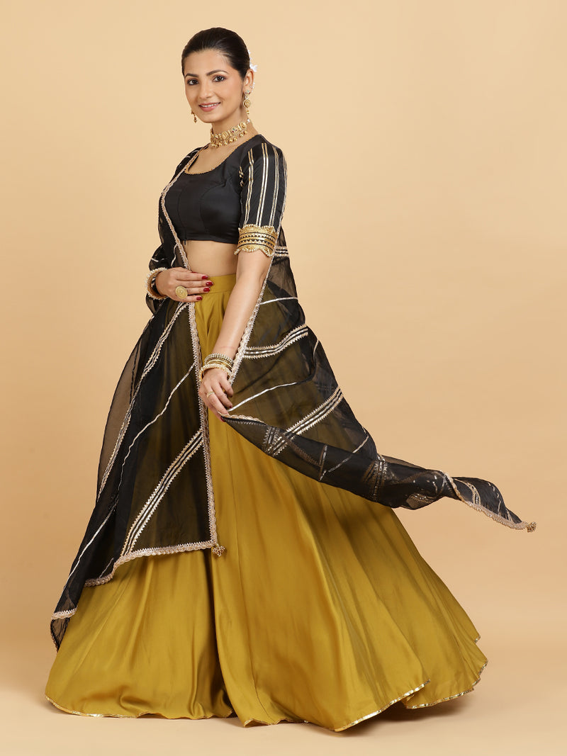 Jhalak Aziza 4-Pc Lehenga Set x Tyohaar | Mustard Lehenga, Charcoal Black Blouse with Chandni Black Dupatta and Cancan Skirt-Binks