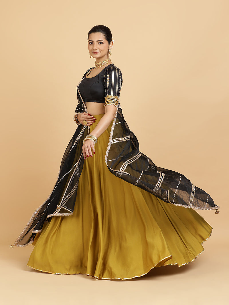 Jhalak Aziza 4-Pc Lehenga Set x Tyohaar | Mustard Lehenga, Charcoal Black Blouse with Chandni Black Dupatta and Cancan Skirt-Binks