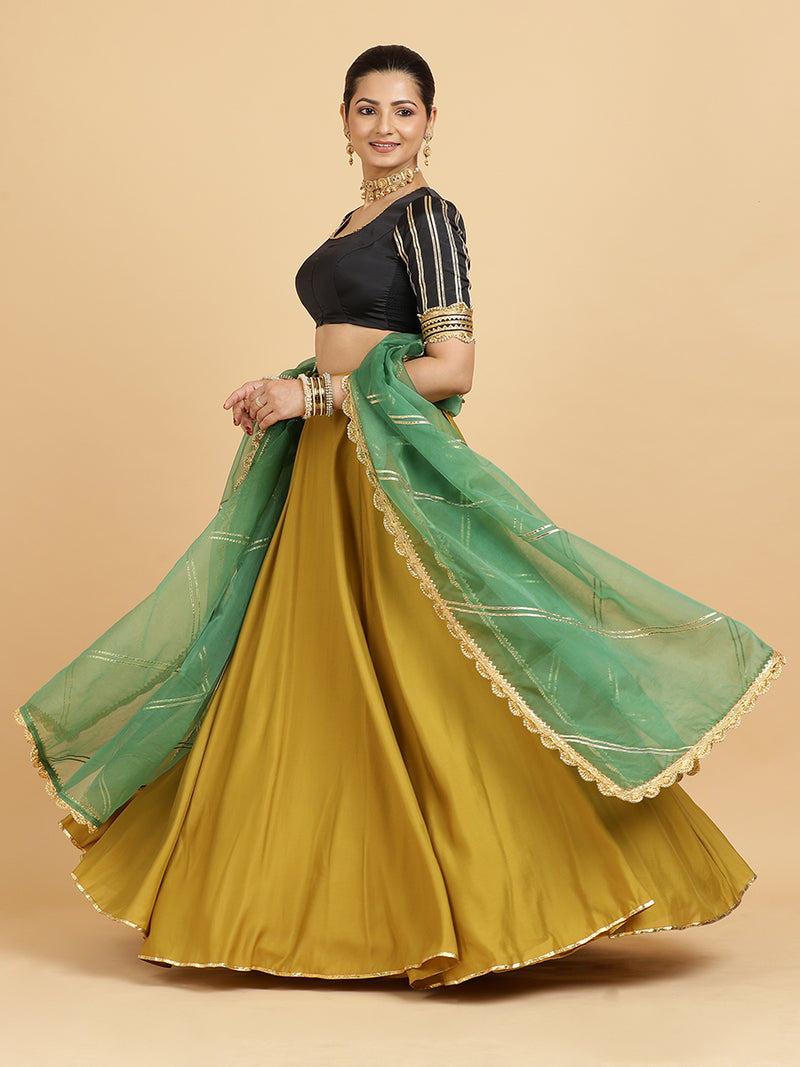 Jhalak Aziza 4-Pc Lehenga Set x Tyohaar | Mustard Lehenga, Charcoal Black Blouse with Emerald Panna Dupatta and Cancan Skirt-Binks