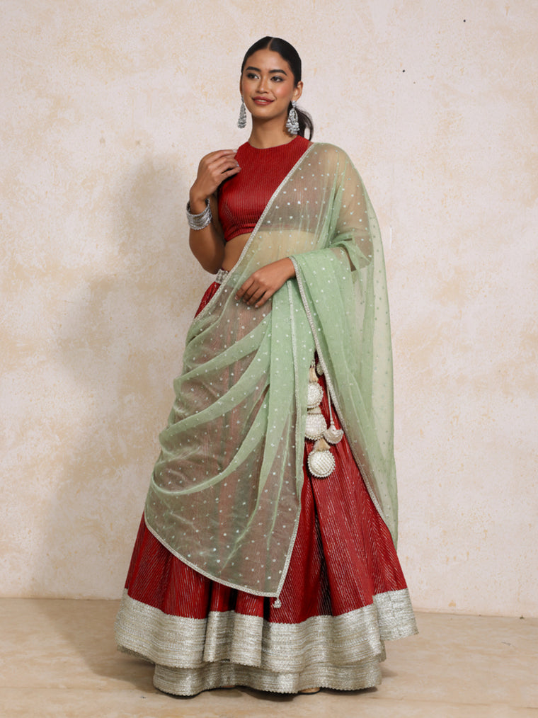 Kimaya x Tyohaar Lehenga Set, in Red 100% Cotton & Lurex, featuring sleeveless and halter neckline, made for party & festive.