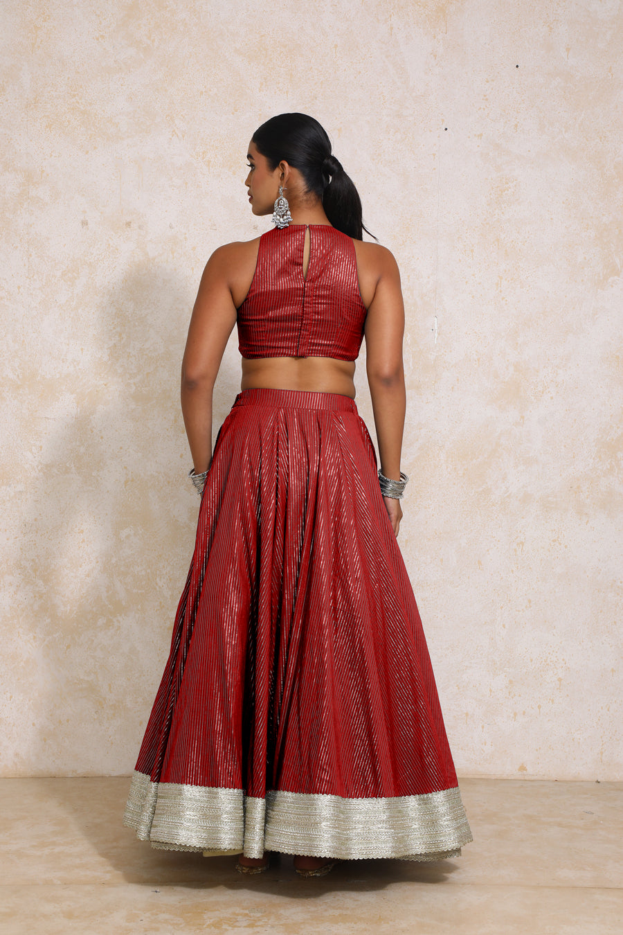 Kimaya x Tyohaar Lehenga Set, in Red 100% Cotton & Lurex, featuring sleeveless and halter neckline, made for party & festive.