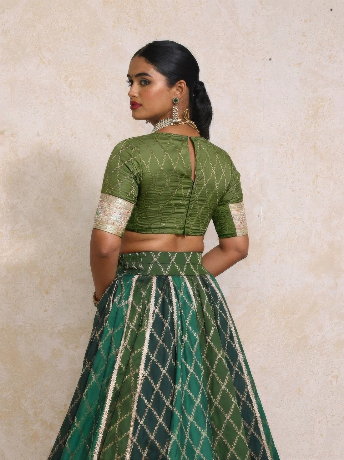 Mabiha x Tyohaar Lehenga Set, in Green Viscose Silk Brocade, featuring elbow sleeves and v-neckline (view 2).