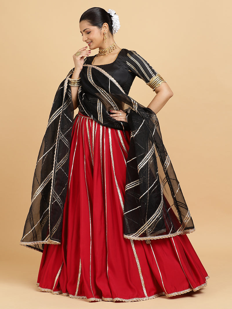 Madhuri Aziza 4-Pc Lehenga Set x Tyohaar | Red Lehenga, Charcoal Black Blouse with Chandni Black Dupatta and Cancan Skirt-Binks