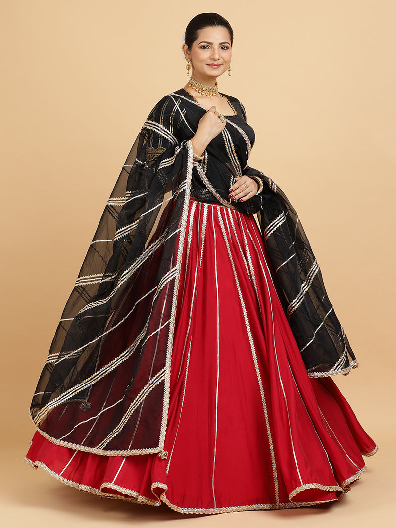 Madhuri Aziza 4-Pc Lehenga Set x Tyohaar | Red Lehenga, Charcoal Black Blouse with Chandni Black Dupatta and Cancan Skirt-Binks