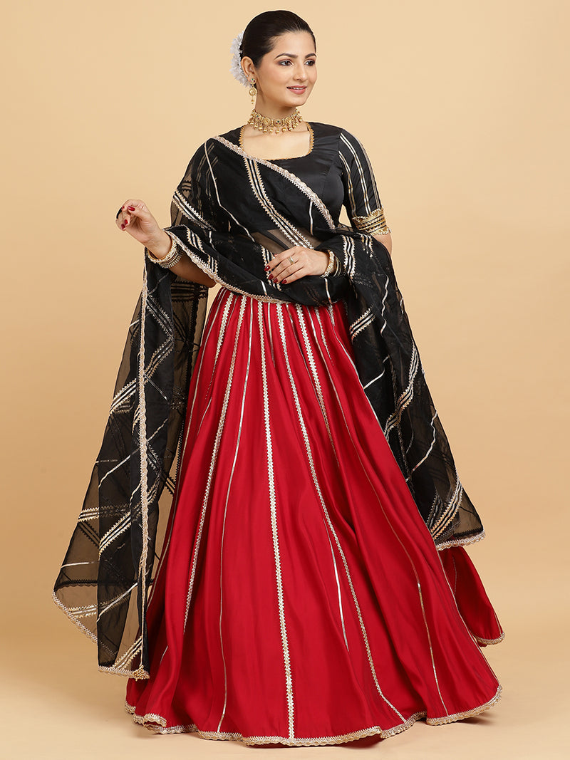 Madhuri Aziza 4-Pc Lehenga Set x Tyohaar | Red Lehenga, Charcoal Black Blouse with Chandni Black Dupatta and Cancan Skirt-Binks