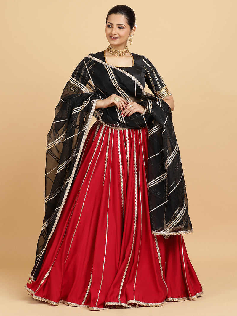 Madhuri Aziza 4-Pc Lehenga Set x Tyohaar | Red Lehenga, Charcoal Black Blouse with Chandni Black Dupatta and Cancan Skirt-Binks