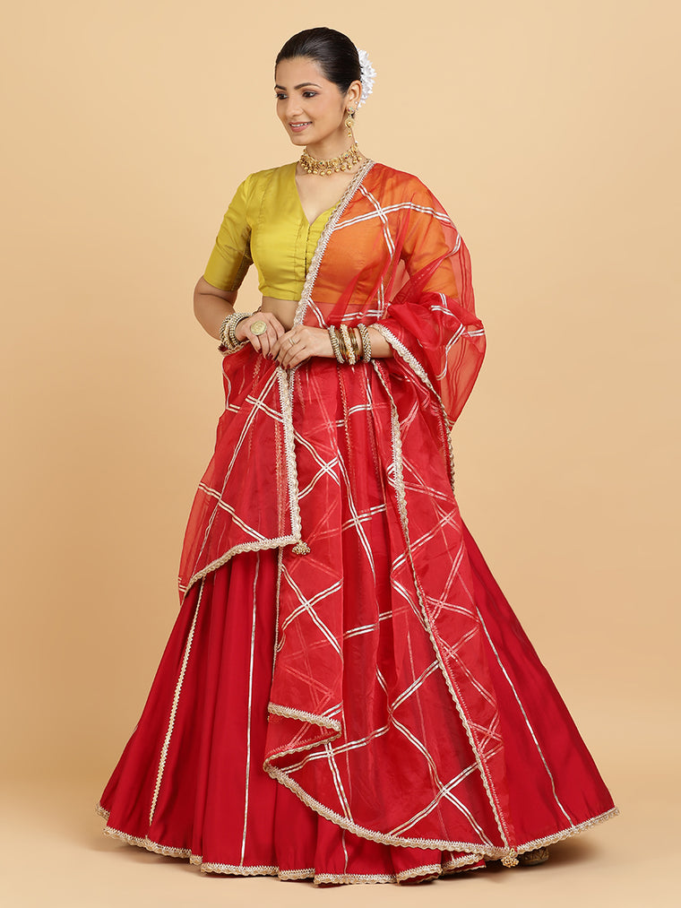 Madhuri Begum 4-Pc Lehenga Set x Tyohaar, in Red, featuring elbow sleeves and v-neckline, made for party & festive (view 2).