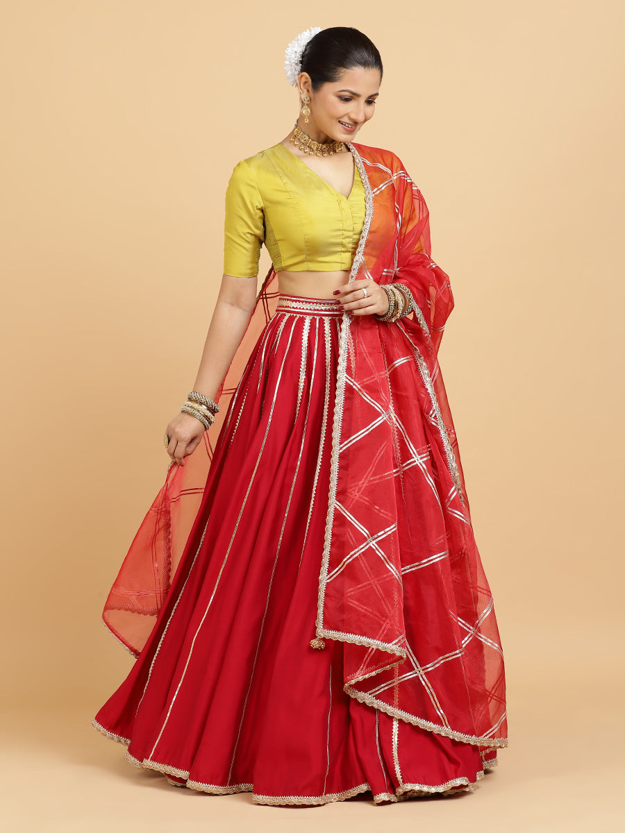 Madhuri Begum 4-Pc Lehenga Set x Tyohaar, in Red, featuring elbow sleeves and v-neckline, made for party & festive (view 4).