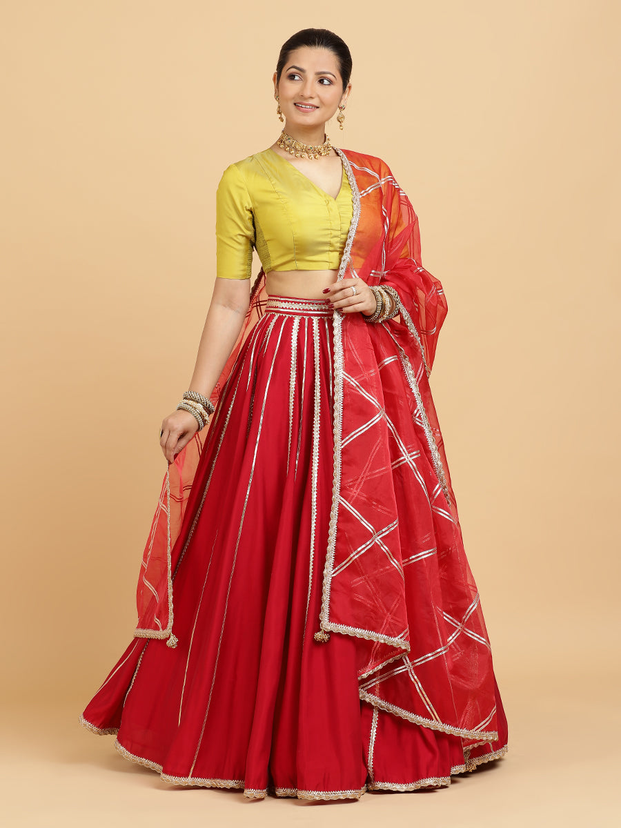 Madhuri Begum 4-Pc Lehenga Set x Tyohaar, in Red, featuring elbow sleeves and v-neckline, made for party & festive (view 5).