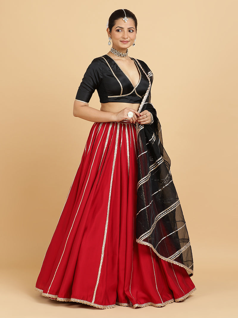 Madhuri Zeenat 4-Pc Lehenga Set x Tyohaar | Red Lehenga, Charcoal Black Blouse with Chandni Black Dupatta and Cancan Skirt-Binks