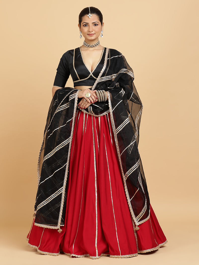 Madhuri Zeenat 4-Pc Lehenga Set x Tyohaar | Red Lehenga, Charcoal Black Blouse with Chandni Black Dupatta and Cancan Skirt-Binks