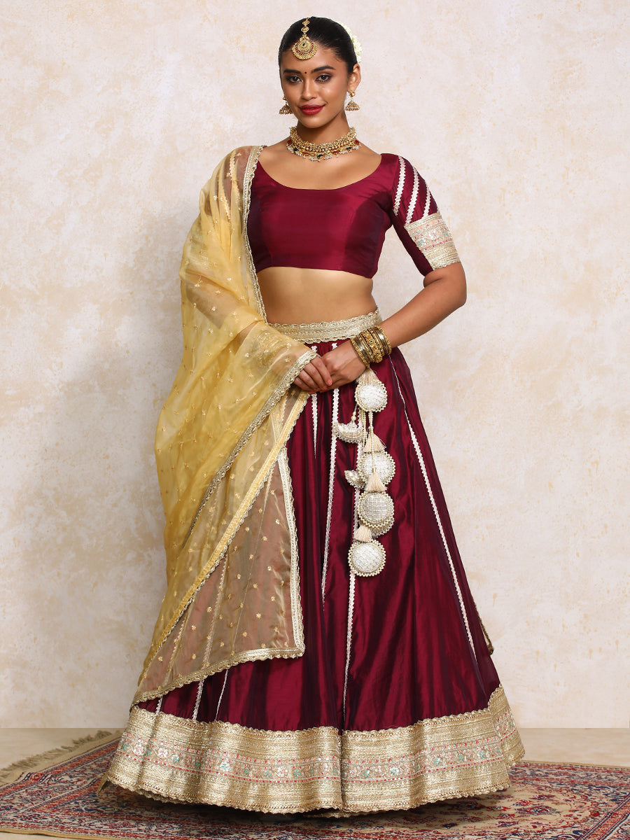 Mahira x Tyohaar Lehenga Set, in Maroon Chandheri, featuring elbow sleeves and scoop neckline, made for party & festive.