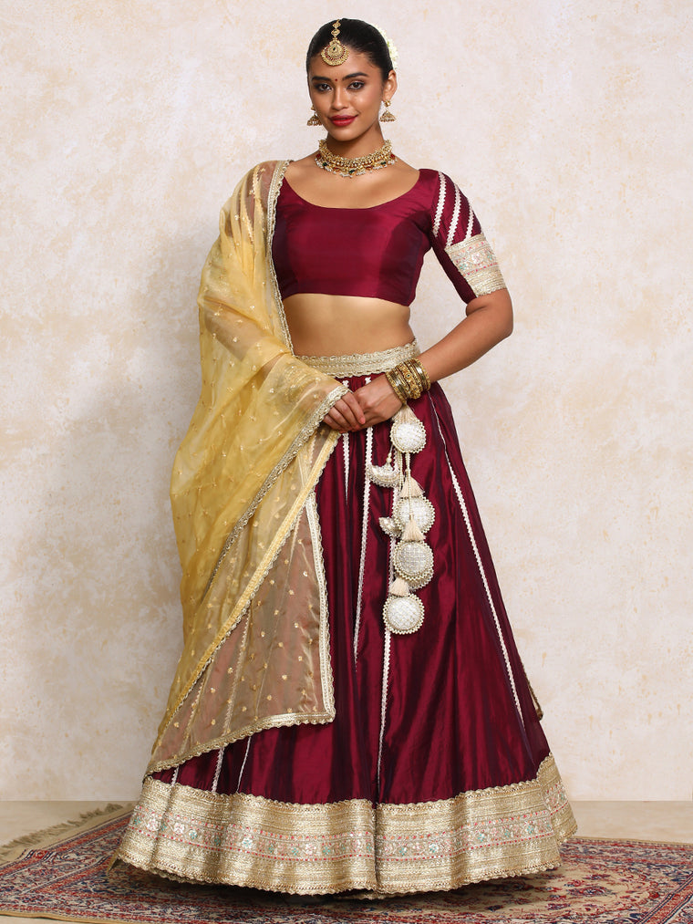 Mahira x Tyohaar Lehenga Set, in Maroon Chandheri, featuring elbow sleeves and scoop neckline, made for party & festive.