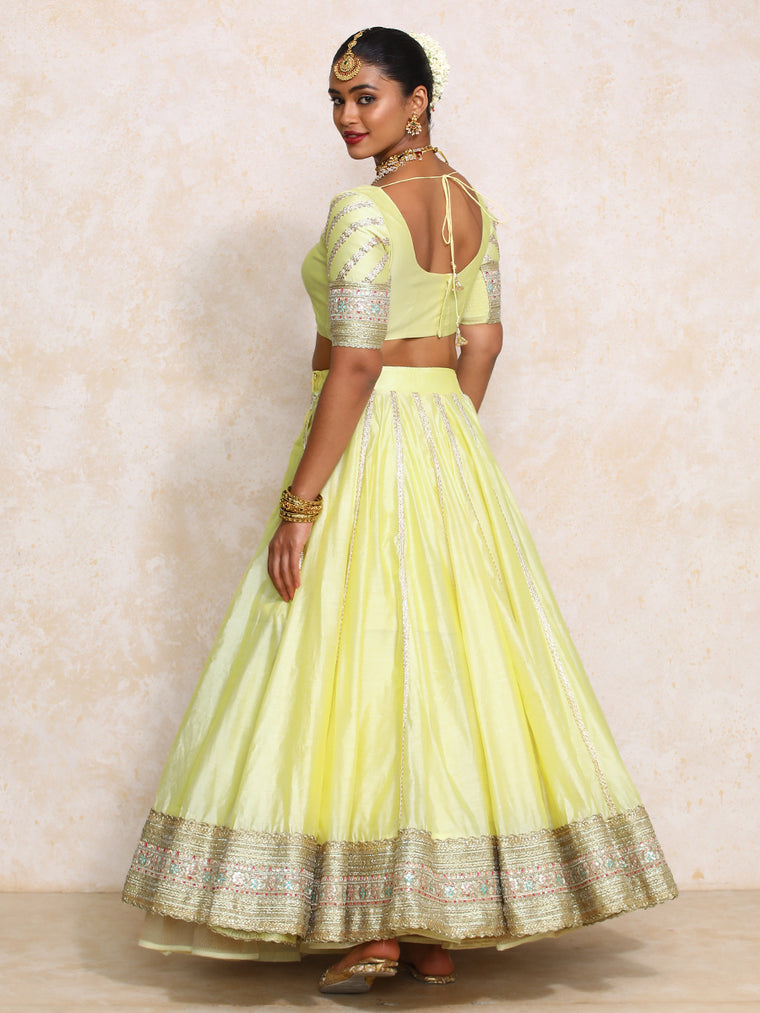 Mahira x Tyohaar Lehenga Set, in Yellow Chandheri, featuring elbow sleeves and scoop neckline, made for party & festive.