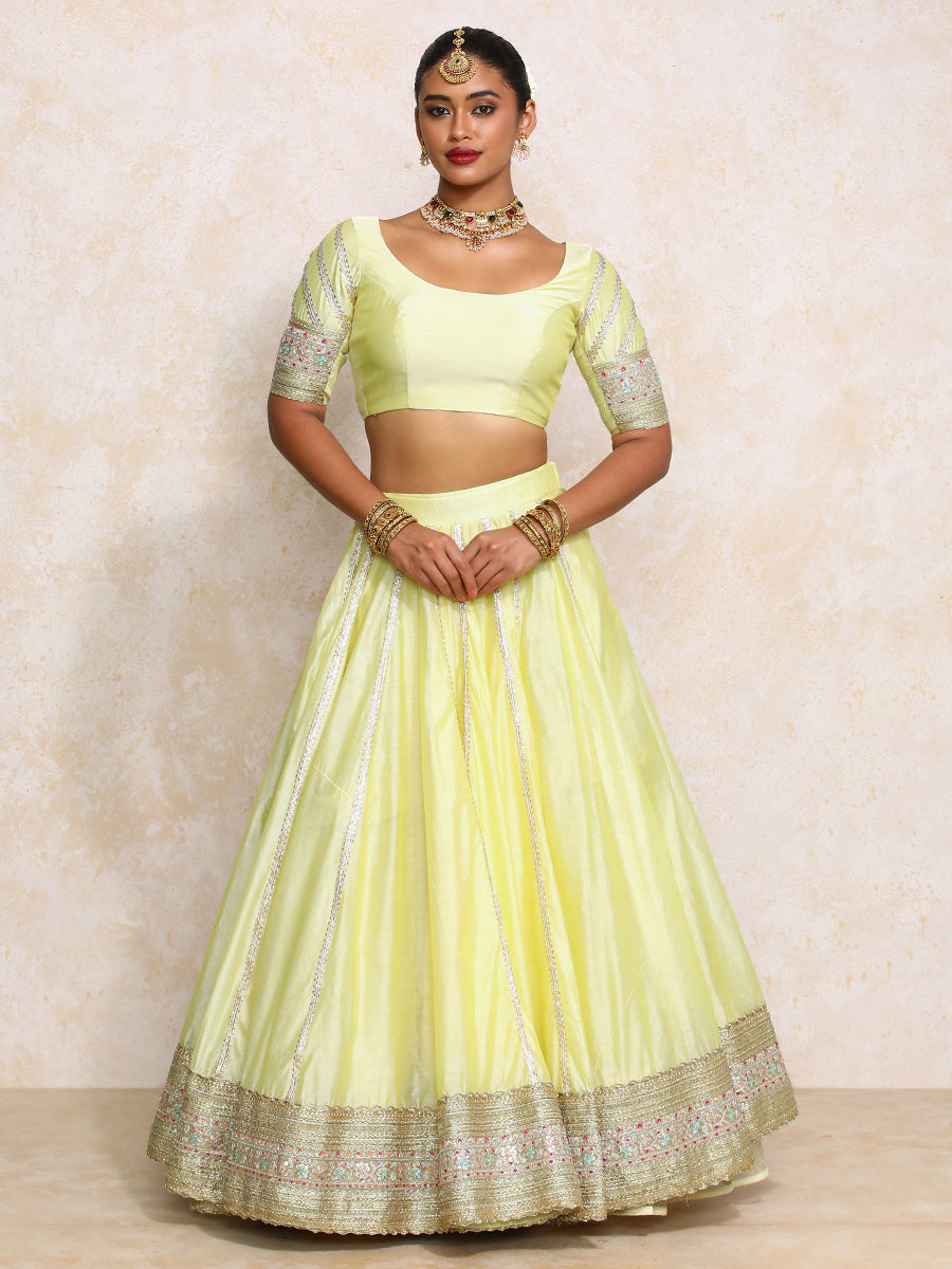 Mahira x Tyohaar Lehenga Set, in Yellow Chandheri, featuring elbow sleeves and scoop neckline, made for party & festive.