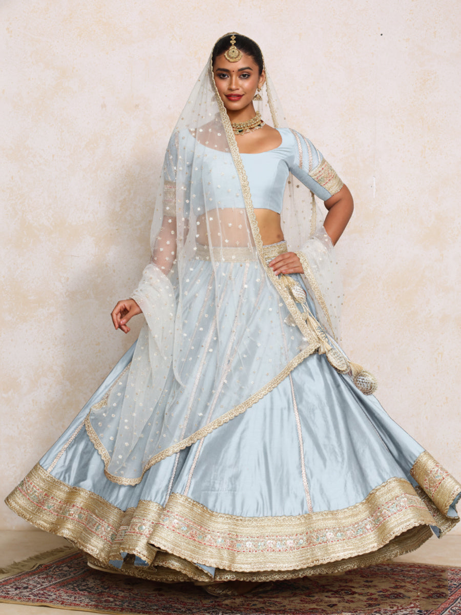 Mahira x Tyohaar Lehenga Set, in Blue Chandheri, featuring elbow sleeves and scoop neckline, made for party & festive.
