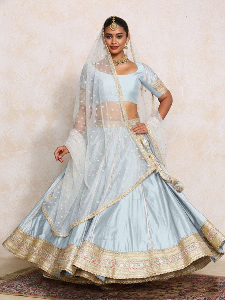 Mahira x Tyohaar Lehenga Set, in Blue Chandheri, featuring elbow sleeves and scoop neckline, made for party & festive.