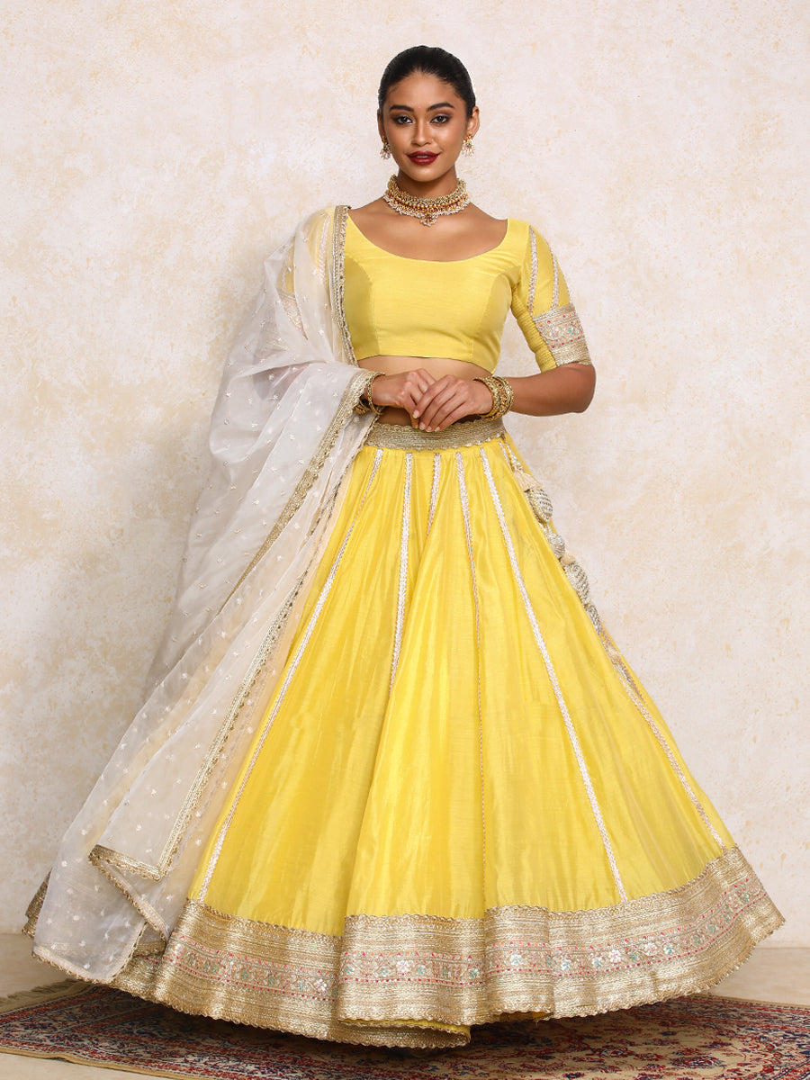 Mahira x Tyohaar Lehenga Set, in Yellow Chandheri, featuring elbow sleeves and scoop neckline, made for party & festive.