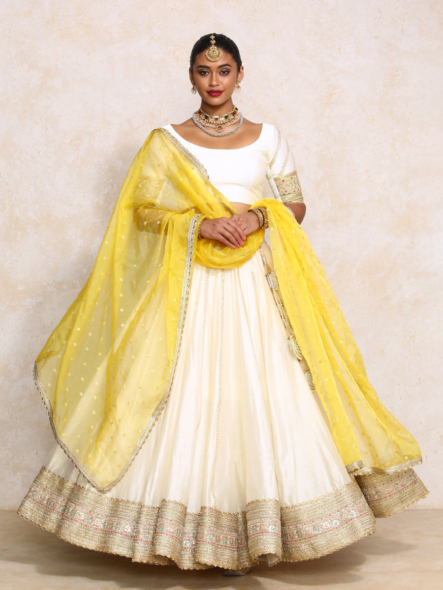 Mahira x Tyohaar Lehenga Set, in White Chandheri, featuring elbow sleeves and scoop neckline, made for party & festive.