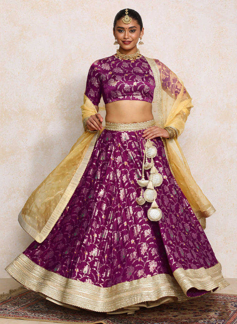 Meenakshi x Tyohaar Lehenga Set, in Purple Meenakari Satin Viscose, featuring elbow sleeves and jewel neckline.