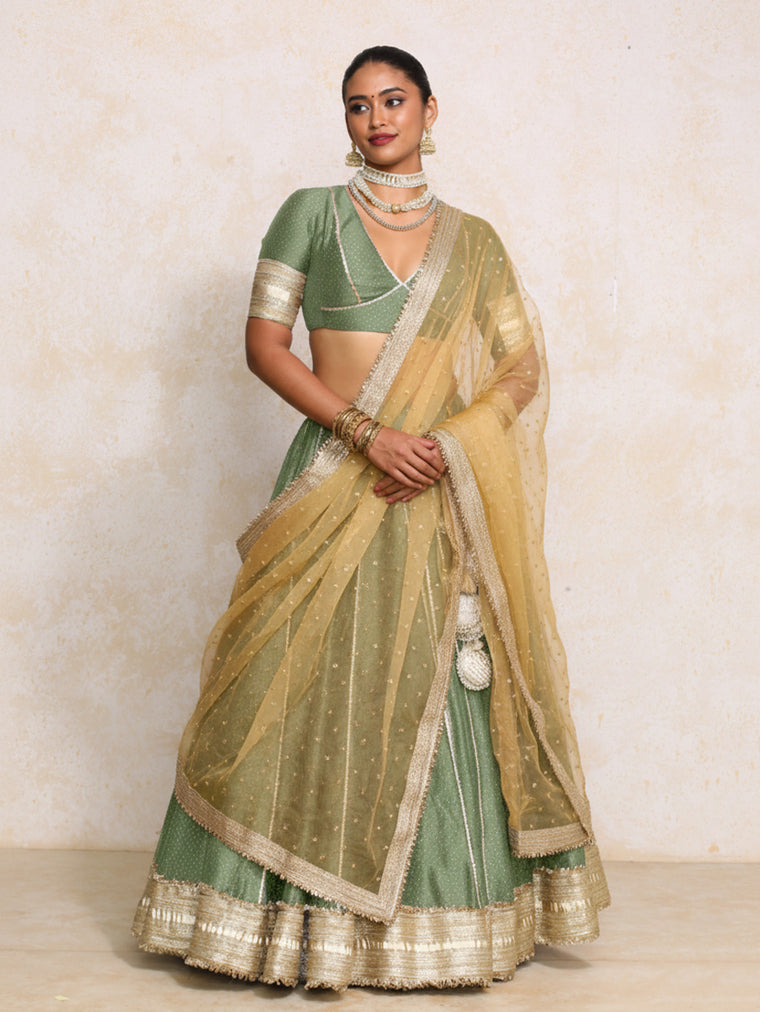 Mehreen x Tyohaar Lehenga Set, in Green Chandheri, featuring elbow sleeves and v-neckline, made for party & festive.