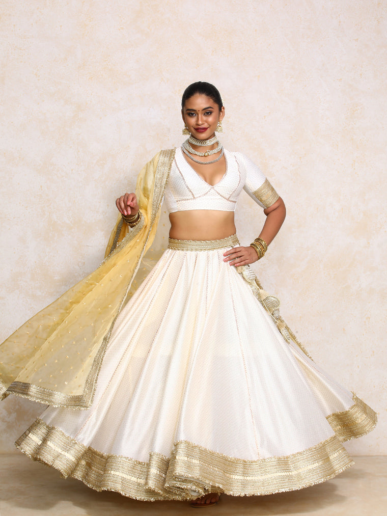 Mehreen x Tyohaar Lehenga Set, in White Chandheri, featuring elbow sleeves and v-neckline, made for party & festive.
