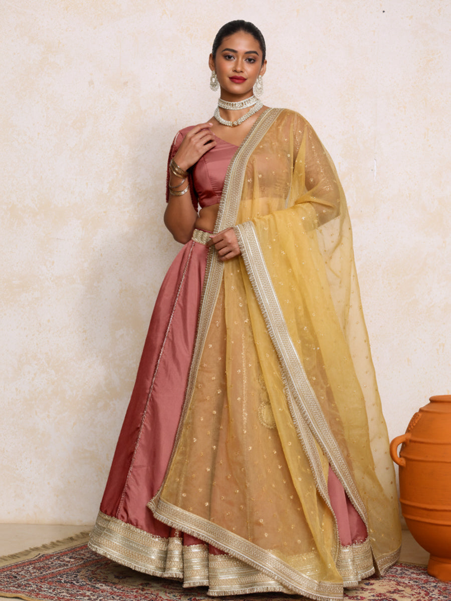Ruhani x Tyohaar Lehenga Set, in Pink Viscose Gold Tissue, featuring elbow sleeves and v-neckline, made for party & festive.