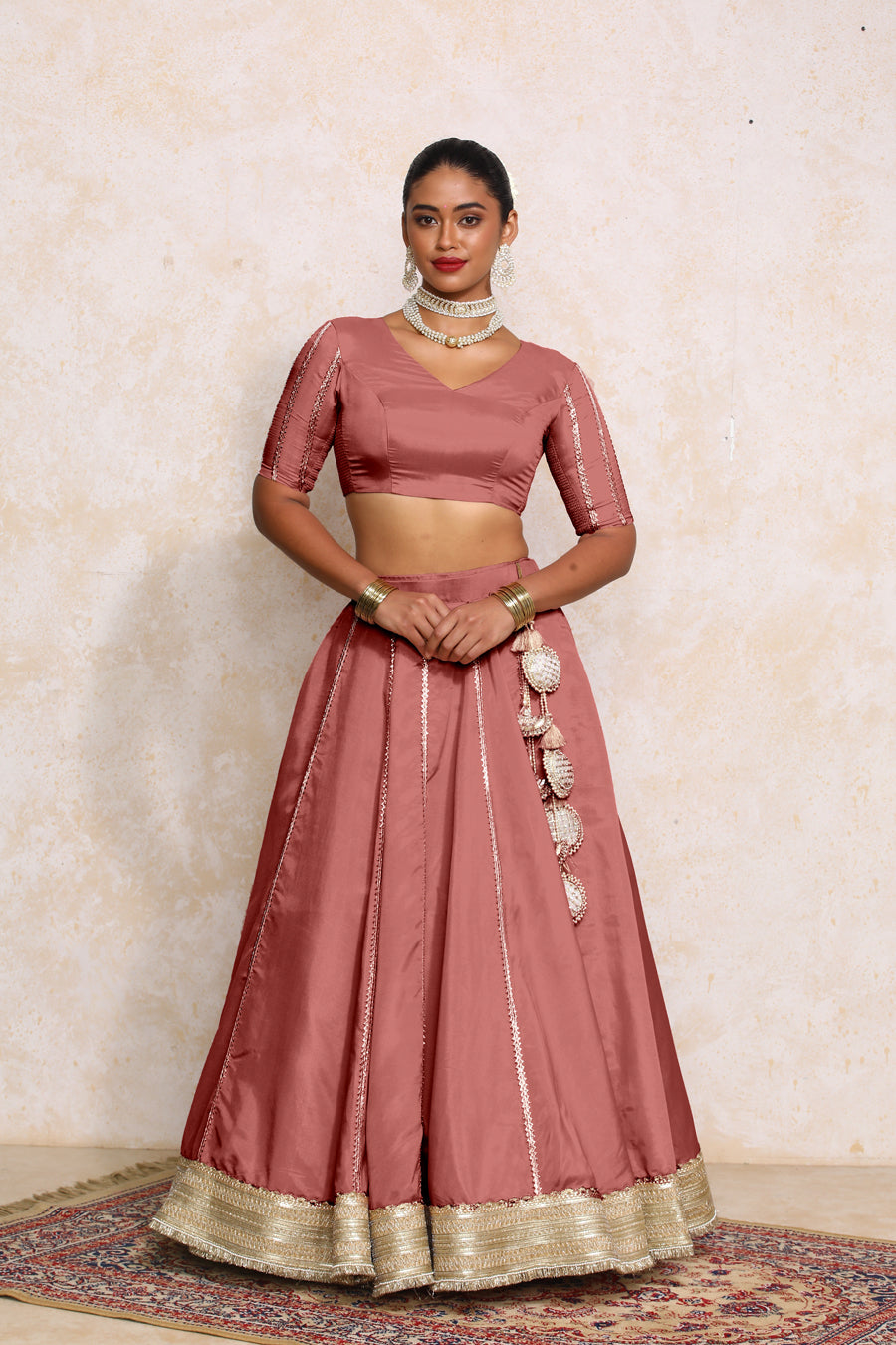 Ruhani x Tyohaar Lehenga Set, in Pink Viscose Gold Tissue, featuring elbow sleeves and v-neckline, made for party & festive.