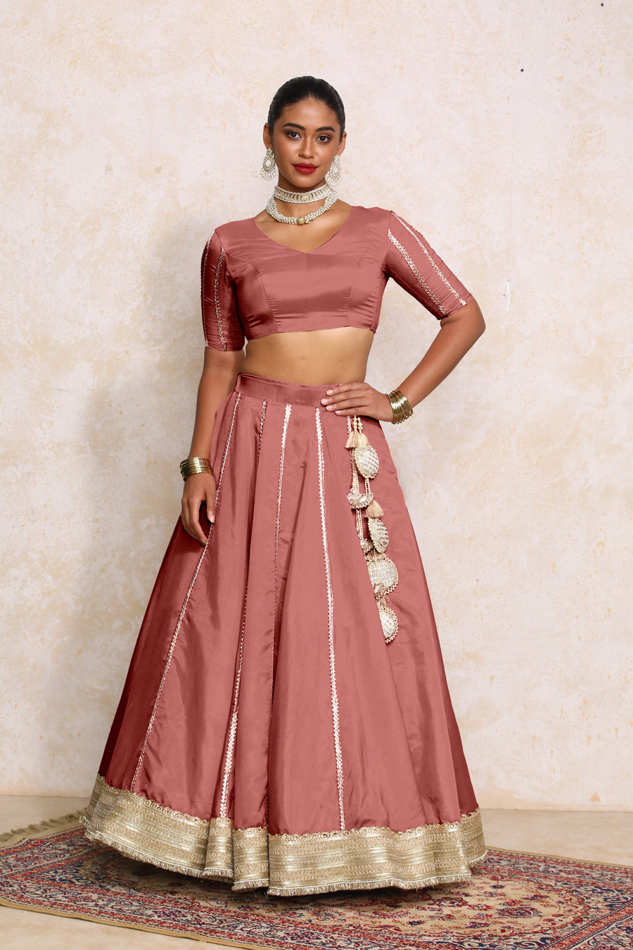 Ruhani x Tyohaar Lehenga Set, in Pink Viscose Gold Tissue, featuring elbow sleeves and v-neckline, made for party & festive.