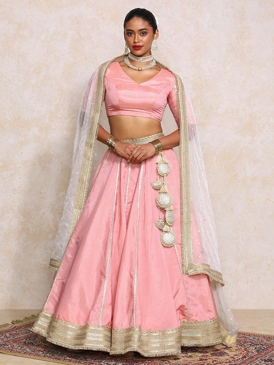 Ruhani x Tyohaar Lehenga Set, in Pink Viscose Gold Tissue, featuring elbow sleeves and v-neckline, made for party & festive.