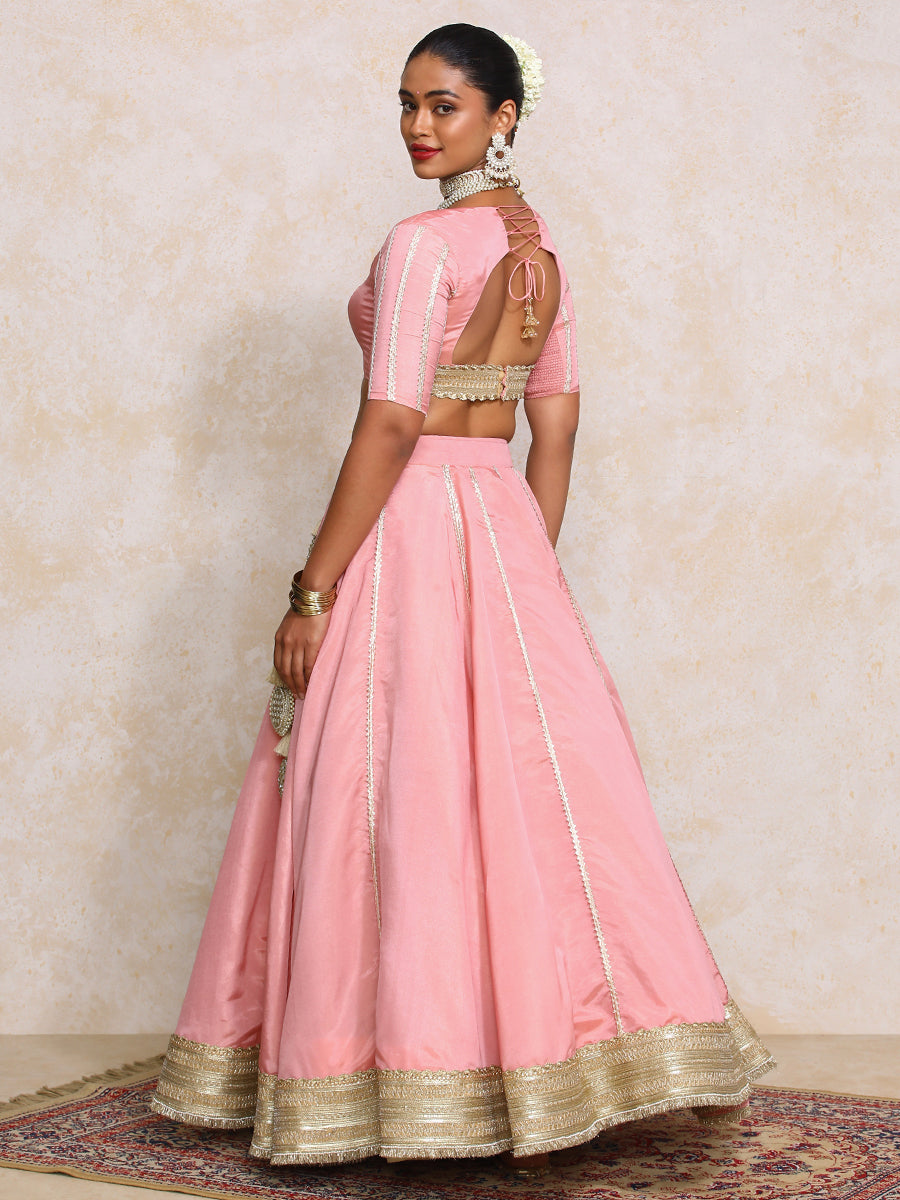 Ruhani x Tyohaar Lehenga Set, in Pink Viscose Gold Tissue, featuring elbow sleeves and v-neckline, made for party & festive.