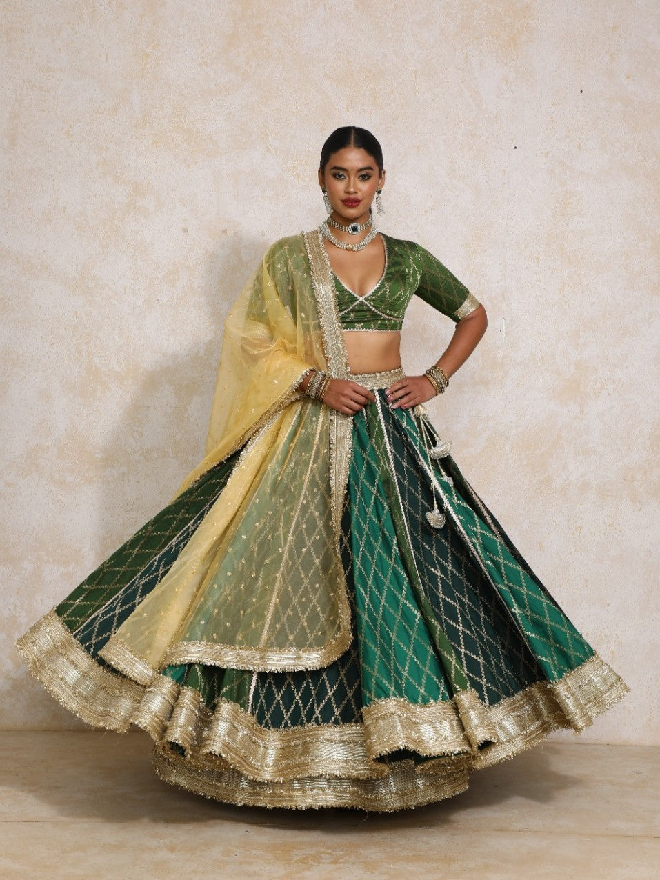 Sahiba x Tyohaar Lehenga Set, in Green Viscose Silk Brocade, featuring elbow sleeves and v-neckline.