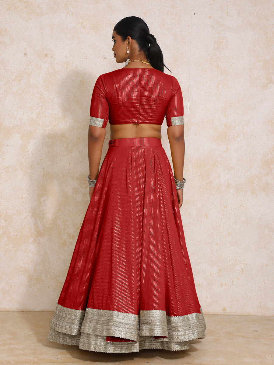 Vareesha x Tyohaar Lehenga Set, in Red 100% Cotton & Lurex, featuring elbow sleeves and v-neckline, made for party & festive.