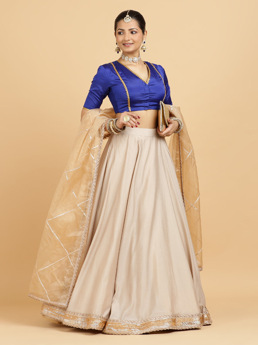 Zainab Begum 4-Pc Lehenga Set x Tyohaar, in Beige, featuring elbow sleeves and v-neckline, made for party & festive (view 3).