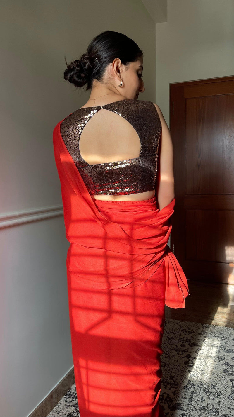 Aadhya x Tyohaar | Sleeveless Gold Sequined Saree Blouse with Curved V-Neck-Binks