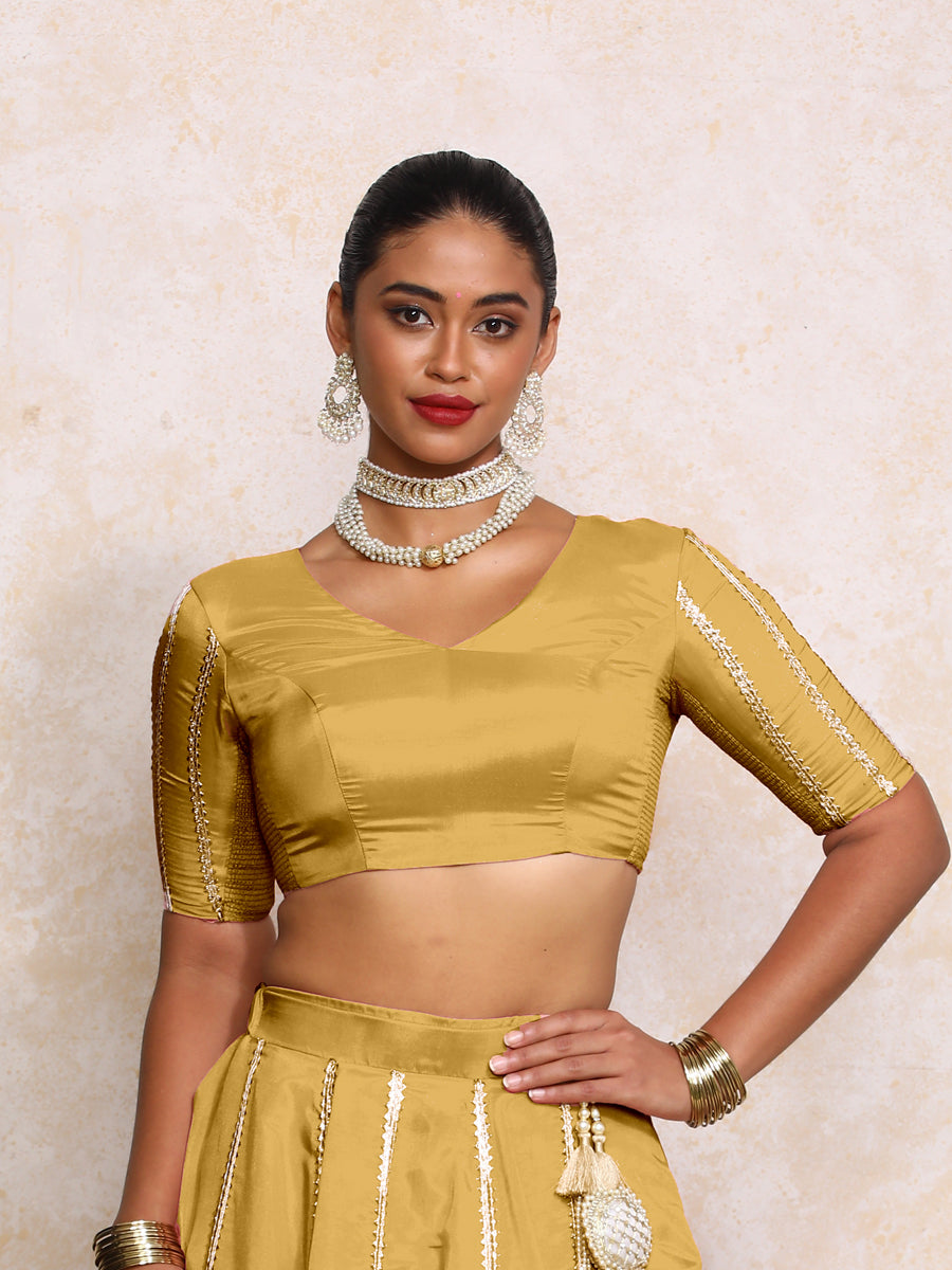 Aashni x Tyohaar Saree Blouse, in Yellow Viscose Gold Tissue, featuring elbow sleeves and v-neckline (view 3).