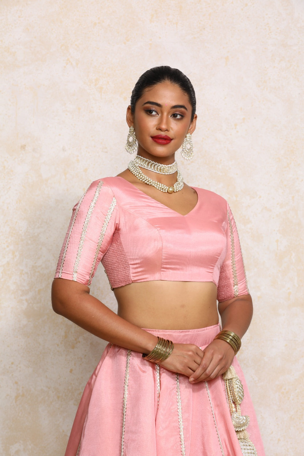 Aashni x Tyohaar Saree Blouse, in Pink Viscose Gold Tissue, featuring elbow sleeves and v-neckline, made for party & festive.
