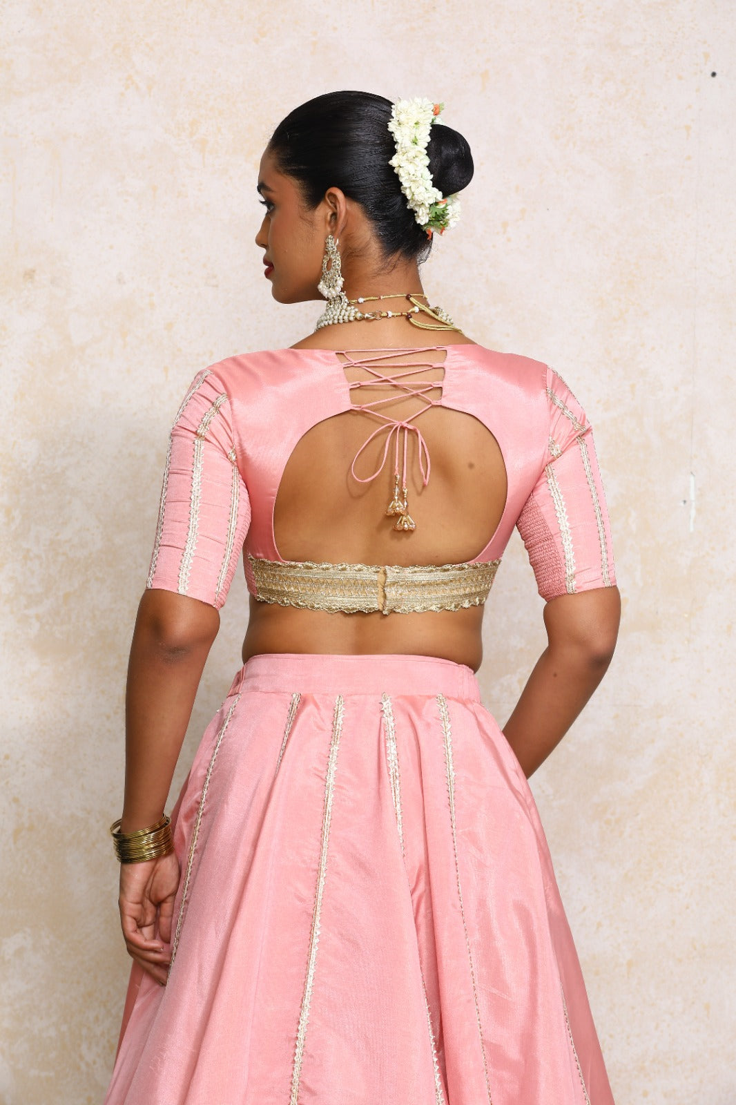 Aashni x Tyohaar Saree Blouse, in Pink Viscose Gold Tissue, featuring elbow sleeves and v-neckline, made for party & festive.