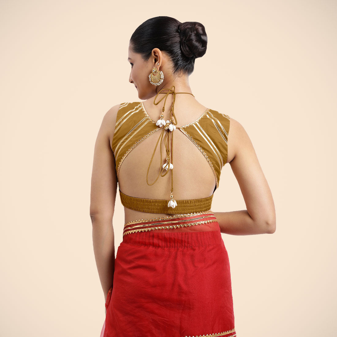 Ahana x Tyohaar Saree Blouse, in Gold Vegan Silk, featuring sleeveless and tie-up neckline, made for party & festive (view 2).