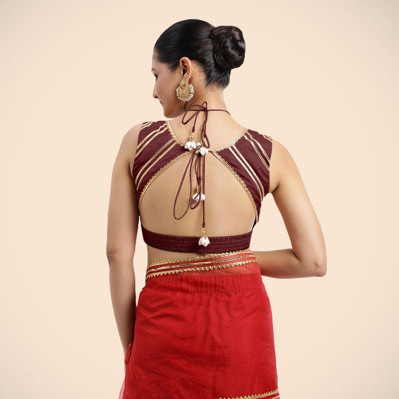 Ahana x Tyohaar | Burgundy Sleeveless FlexiFit™ Saree Blouse with Plunging Neckline and Back Cut Out with Tasteful Golden Gota Lace Embellishment-Binks