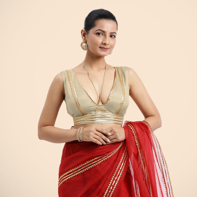 Ahana x Tyohaar | Cream Sleeveless FlexiFit™ Saree Blouse with Plunging Neckline and Back Cut Out with Tasteful Golden Gota Lace Embellishment-Binks