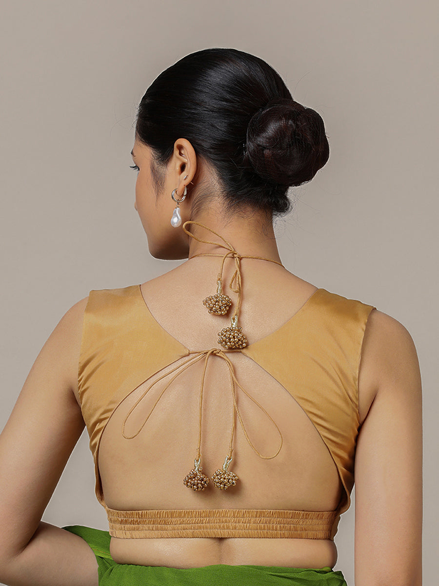 Ahana x Rozaana Saree Blouse, in Gold Vegan Silk, featuring sleeveless and tie-up neckline, made for party & festive (view 2).