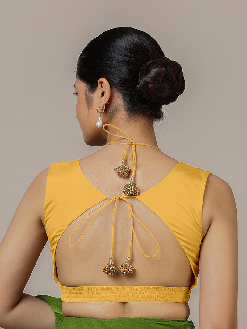 Ahana x Rozaana | Sleeveless Marigold Yellow FlexiFit™ Saree Blouse with Tie-Up Neck-Binks