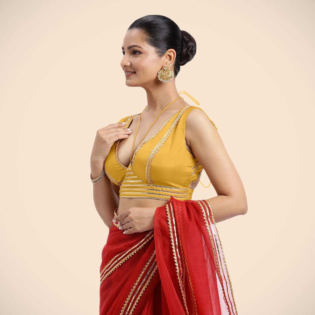 Ahana x Tyohaar Saree Blouse, in Yellow Artificial Silk, featuring sleeveless and tie-up neckline, made for party & festive.