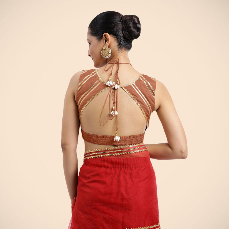 Ahana x Tyohaar | Metallic Copper Sleeveless FlexiFit™ Saree Blouse with Plunging Neckline and Back Cut Out with Tasteful Golden Gota Lace Embellishment-Binks