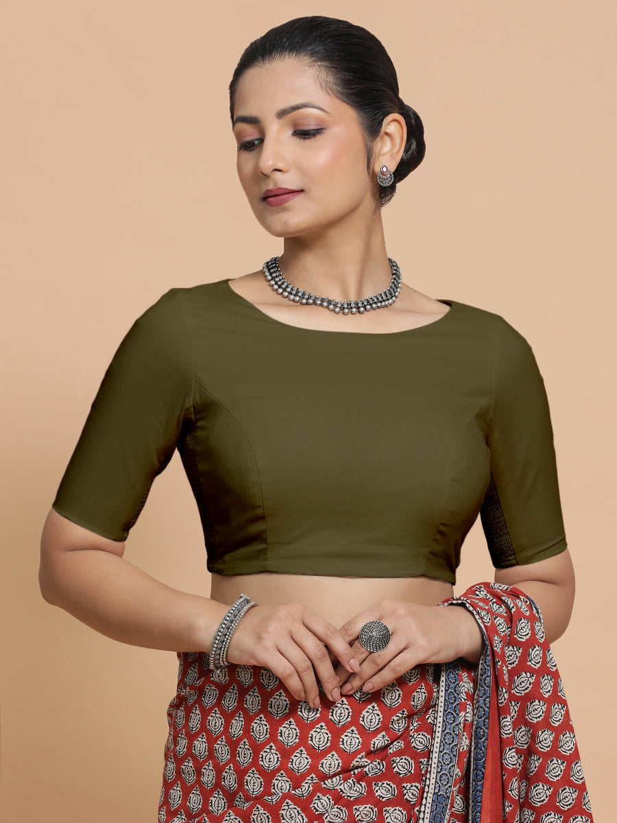 Alka x Rozaana Saree Blouse, in Green Linen, featuring elbow sleeves and boat neckline, made for daily & work.