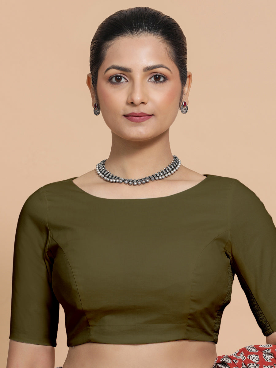 Alka x Rozaana Saree Blouse, in Green Linen, featuring elbow sleeves and boat neckline, made for daily & work (view 5).