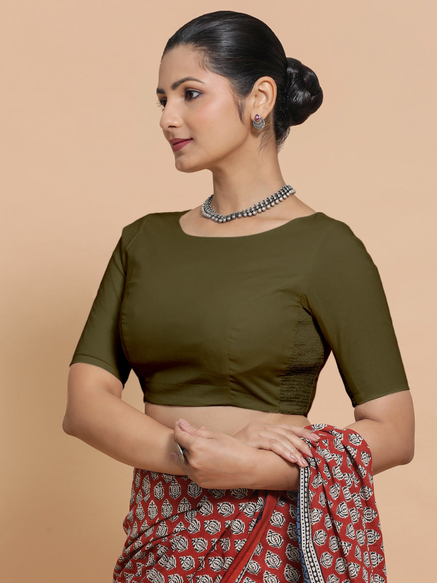 Alka x Rozaana Saree Blouse, in Green Linen, featuring elbow sleeves and boat neckline, made for daily & work (view 7).